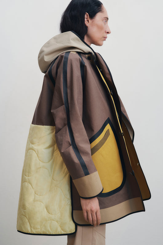 THE SHORT BONDED RAINCOAT